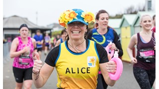 Runner in a yellow vest